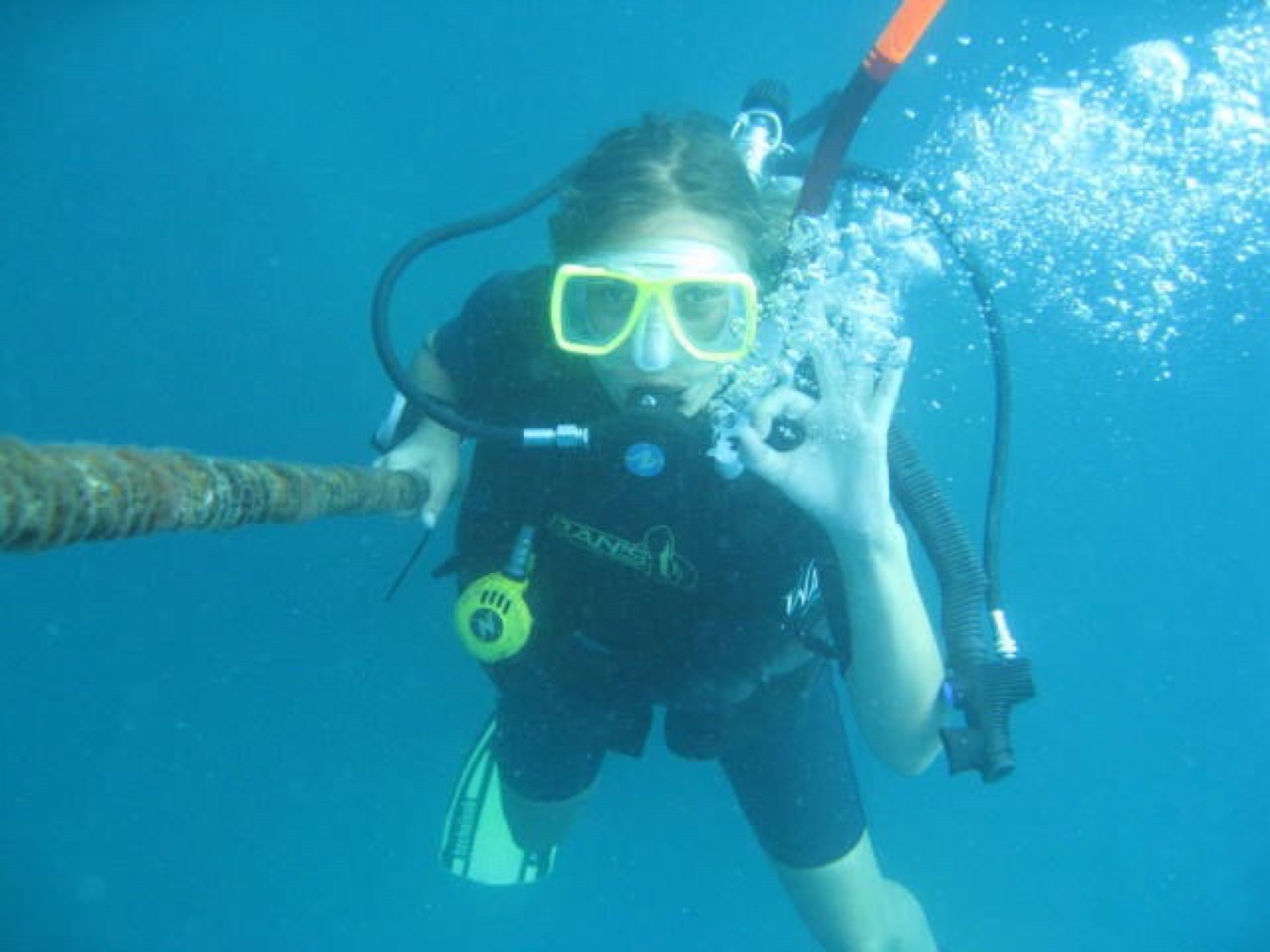 Lola scuba diving underwater